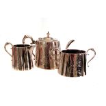 A silver plated three piece tea set, having floral engraved design, together with two plated basting