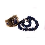 A lapis lazuli rough nugget necklace, with white metal clasp, together with a white metal and