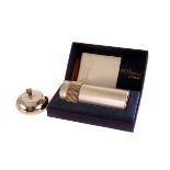 A Dupont table lighter, in retailers box, together with a Davidoff white metal ashtray in