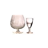 A quantity of engraved wine, brandy and liquor glasses, including a pair of Regency goblets (