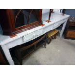 A long pine 19th century painted serving table, with two small drawers within the frieze, approx