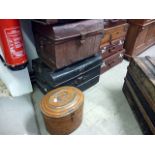 A 19th century tin oval hat box, with painted exterior and two other tin trunks (3)