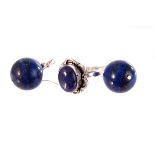 A silver and lapis lazuli dress ring, the oval bead set in 925 marked silver, together with a pair