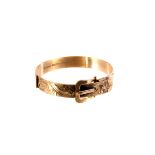 A 9ct gold garter bangle, with engraved floral decoration, approx 23.7g