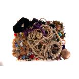 A collection of costume jewellery, including beads, brooches chains and more (parcel)