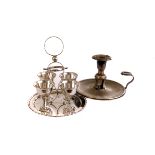 A group of silver plated items, to include a toast rack, egg waiter, jugs, candlesticks and more (
