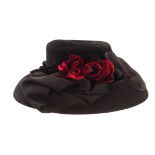 A designer ladies hat by Bailey Tomlin, large brim hat in black velvet, with black bow and red roses