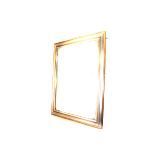 A large gilt framed mirror, rectangular bevelled glass in gilt and silver painted frame, 93cm by