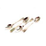 A group of twelve Georgian and Victorian silver teaspoons, fiddle pattern, some with monogram G,