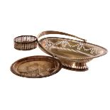 A plated serving basket, with pierced design and handle, together with a plated coaster and a silver