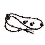 A faceted black bead necklace, together with black bead and gem set earrings (3)