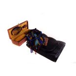 An Art Deco beadwork bag, blue ground with yellow, red, green design, also in the lot a 1950 leather