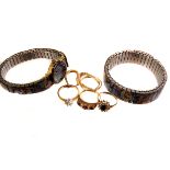 A small selection of gold jewellery, comprising three gem set rings and a pair of earrings, approx