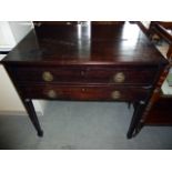 A mahogany George III secretaire table, with half hinged top over blind drawers, opening to reveal