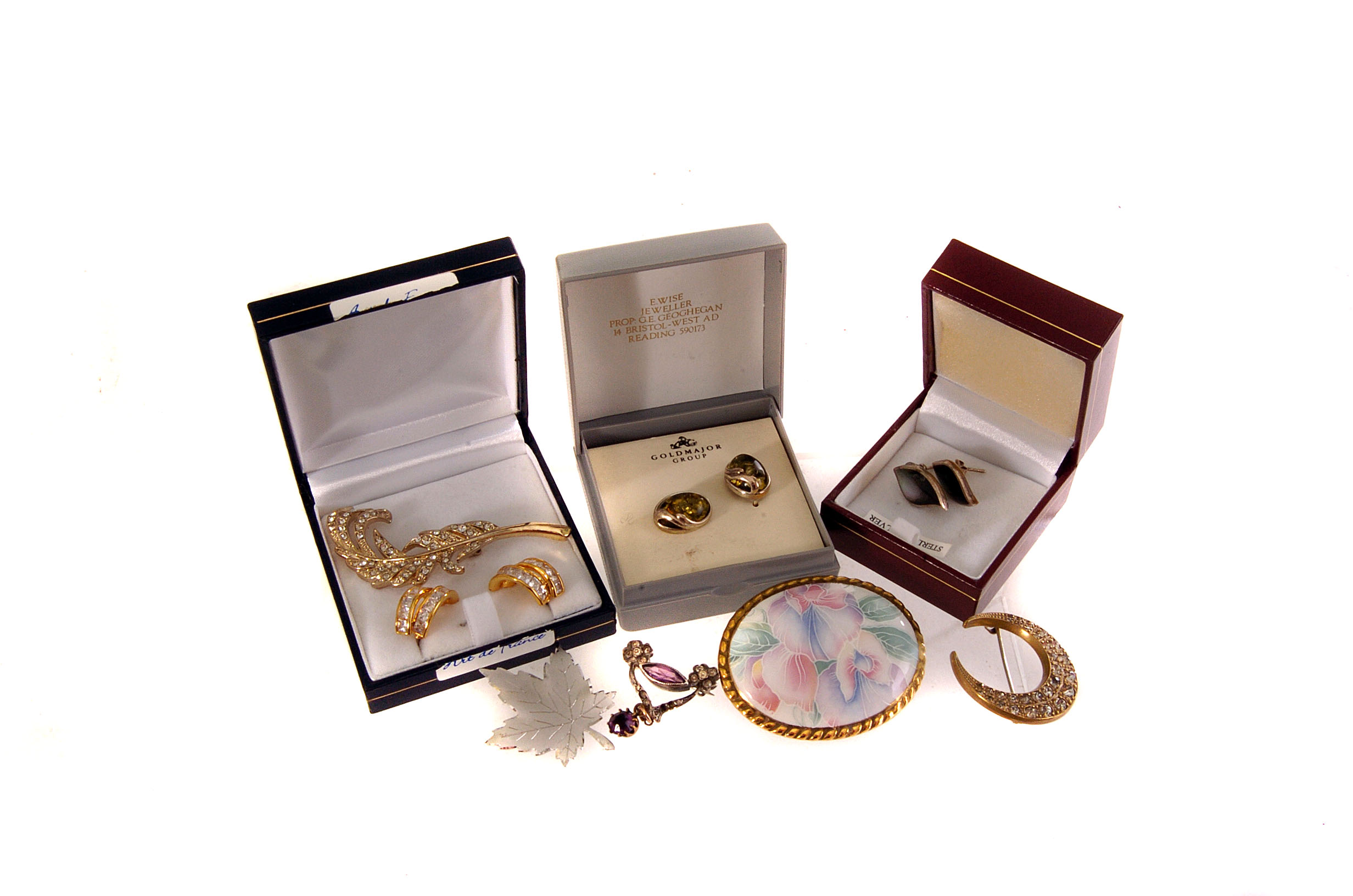 A selection of various costume jewellery, to include a silver and gem set brooch, marcasite brooch