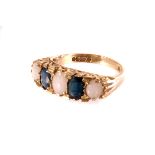 A five stone opal and sapphire ring, the five stones alternating in gold mount on 9ct gold band,