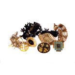A selection of costume jewellery, to include a gilt metal Triffari brooch, a silver gilt brooch