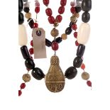 A cherry amber bead and resin necklace, the separated by resin beads with large resin pendant,
