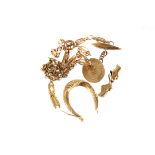 A small selection of 9ct gold jewellery, to include a bracelet, an earring, a cufflink and more,