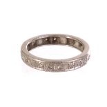 An 18ct white gold eternity ring, having clear stones set in the white metal, approx 4g, size M