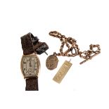 A 9ct gold Deco gents wristwatch, on brown leather strap, AF, together with a 9ct gold fob chain and