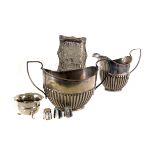 A small selection of silver and plated items, to include a silver dish, a plated milk jug and