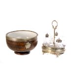 A Victorian oak footed bowl, with white metal mounted rim and porcelain liner, together with a