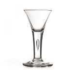 An 18th century wine glass, with drawn bowl on a tear drop stem, on a plain foot 13.5cm H