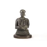 A vintage African lead figural sculpture, the Simon Muguni figure of Zulu Nkehli from the waist