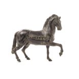 A 19th century bronze Tang style horse, with one leg lifted and in head harness and saddlecloth 24cm