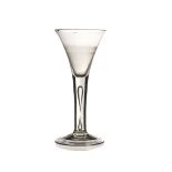 An 18th century wine glass, with drawn trumpet stem and double tear drop captive bubble stem 18.