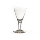 An 18th century wine glass, with drawn trumpet bowl, and tear drop stem, on plain foot