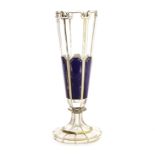 A 19th century glass trumpet vase, of faceted form a with royal blue overlaid panels, and gilt trim,