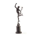 A 19th century bronze figure of Mercury after Giambolgna, the tall athletic figure balancing on
