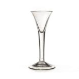 An 18th century wine glass, with drawn trumpet bowl on a plain stem and foot 15.5cm H