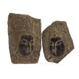 Two ancient Chinese carved hardstone panels, both sections in soapstone of female heads, probably