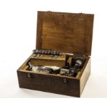 A vintage IME watch makers lathe, presented in a wooden IME box with various dies and parts