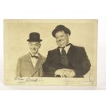 Laurel And Hardy Autograph: vintage photograph signed by Stan Laurel and Oliver Hardy, signature