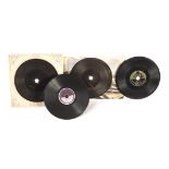 Miniature Records: Four Imperial and Rex 3½in records; an Idris advertising card record; and four