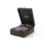 Portable gramophone: a Colum­bia 204, with 15A soundbox (tears in lid)