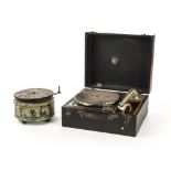 Portable gramophones: a Lissenola No. 9, in black case; and a circular metal nursery gramophone,