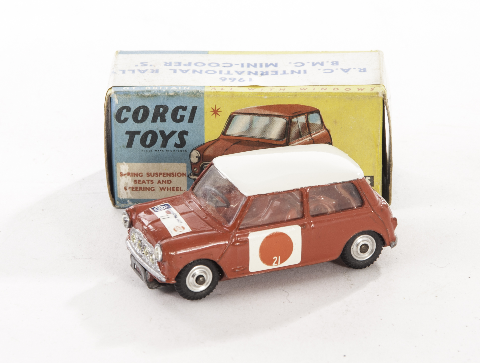 A Corgi Toys 333 Austin Mini Cooper SUN RAC Rally, red body, white roof, red interior, SUN decals,