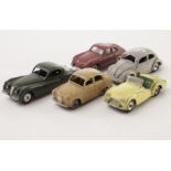 A Dinky Toys 157 Jaguar XK120, dark sage green body, 105 Triumph TR2, lemon yellow body, 181