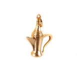 A continental yellow metal charm pendant, formed as an Arabic style coffee pot, with Italian