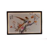 An oriental silk two birds amongst foliage, framed and glazed, with Tunley & Son label verso, approx