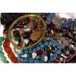 A large collection of costume and hardstone jewellery, including a lapis lazuli fringe necklace,
