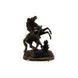 A pair of spelter Marly Horses, the horses rearing up as their handlers are trying to contain