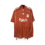 A Liverpool signed football shirt,  No. 8, for Gerrard, signed by him and Raffi Benitez, made by