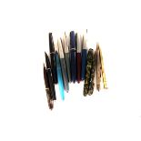 A selection of cartridge and fountain pens, including a 14K gold nib Parker, a Waterman's Ideal with