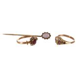 A 9ct gold ruby and seed pearl dress ring, together with another similar example, plus a gold and